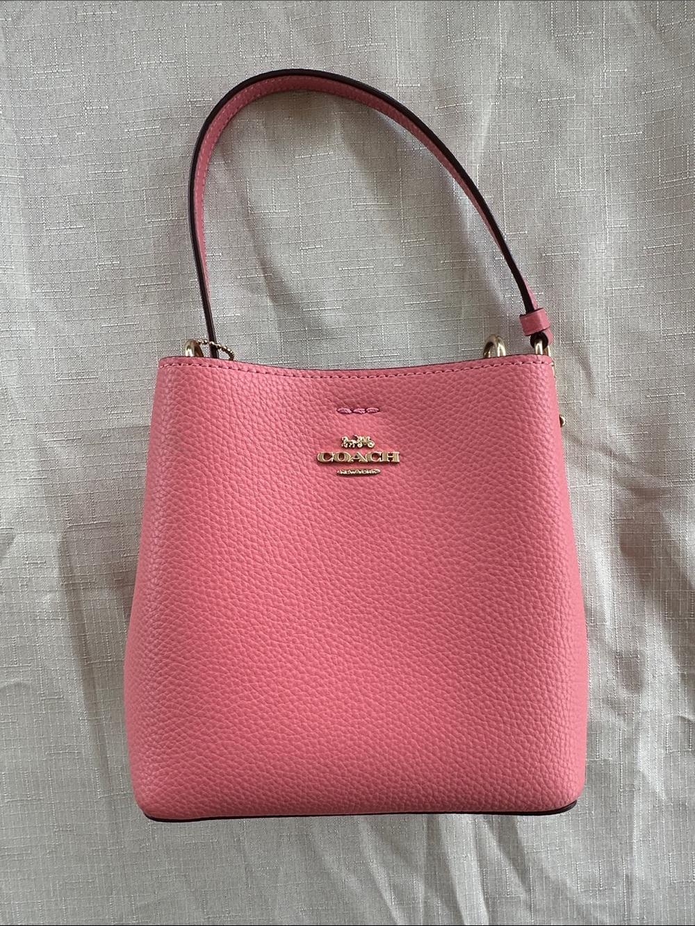 Coach mini town bucket bag in pink